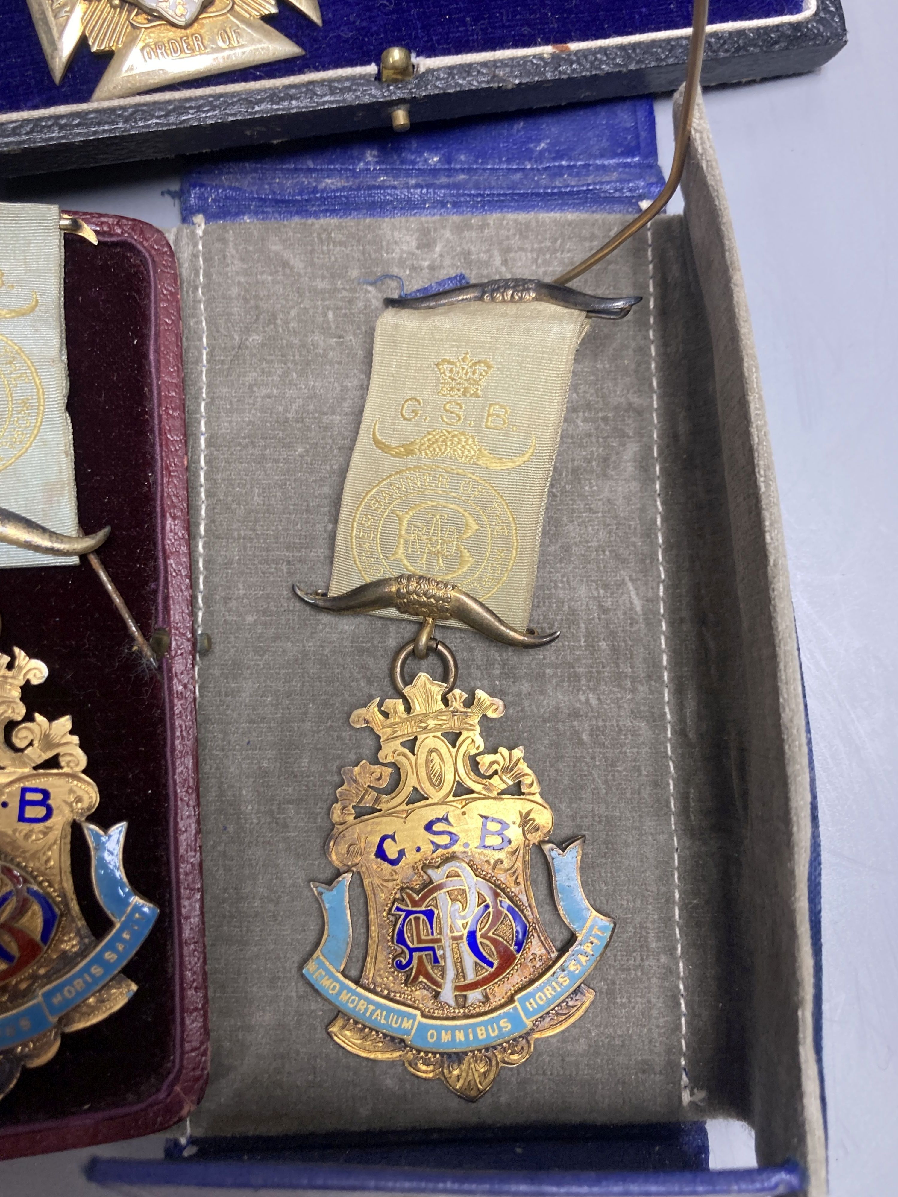 Five assorted early to mid 20th century including silver gilt and enamel masonic jewels & a 1935 Silver Jubilee Medal